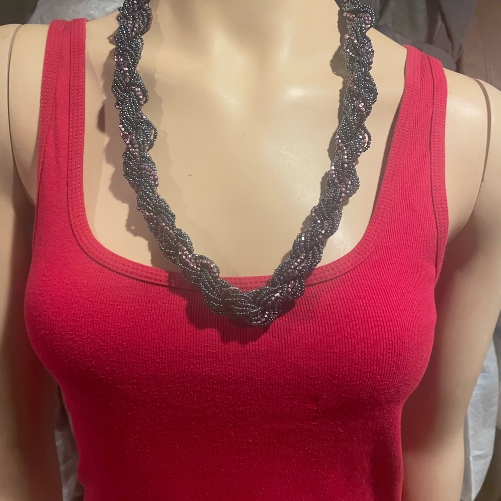 Braided Necklace it has like blue and pink and it very, very pretty